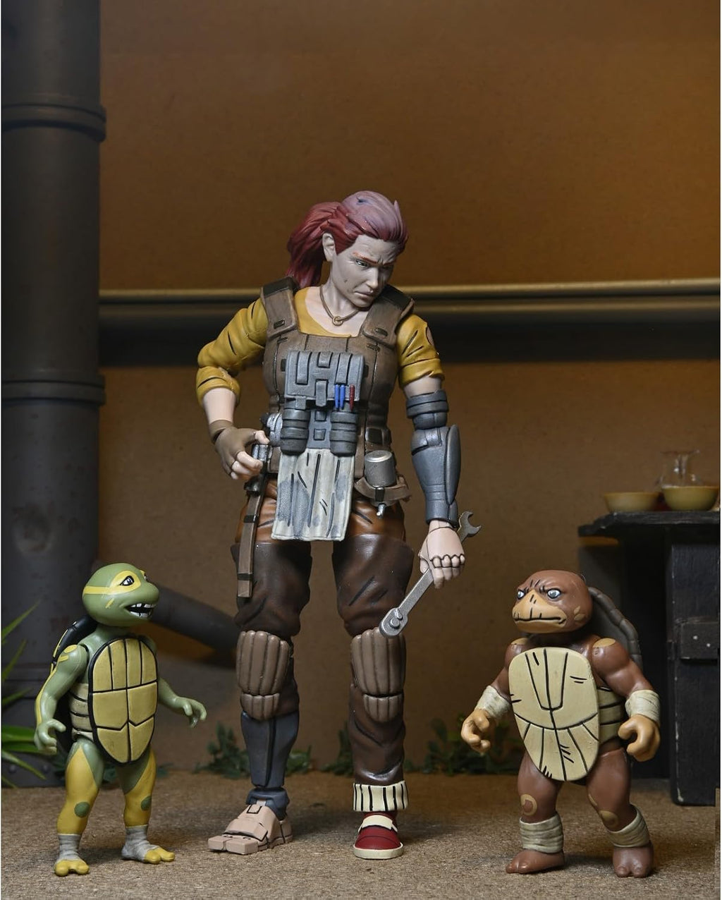 Figura Grammy April with Baby Yi & Moja – TMNT The Last Ronin- The Lost Years – 7” Scale - Neca